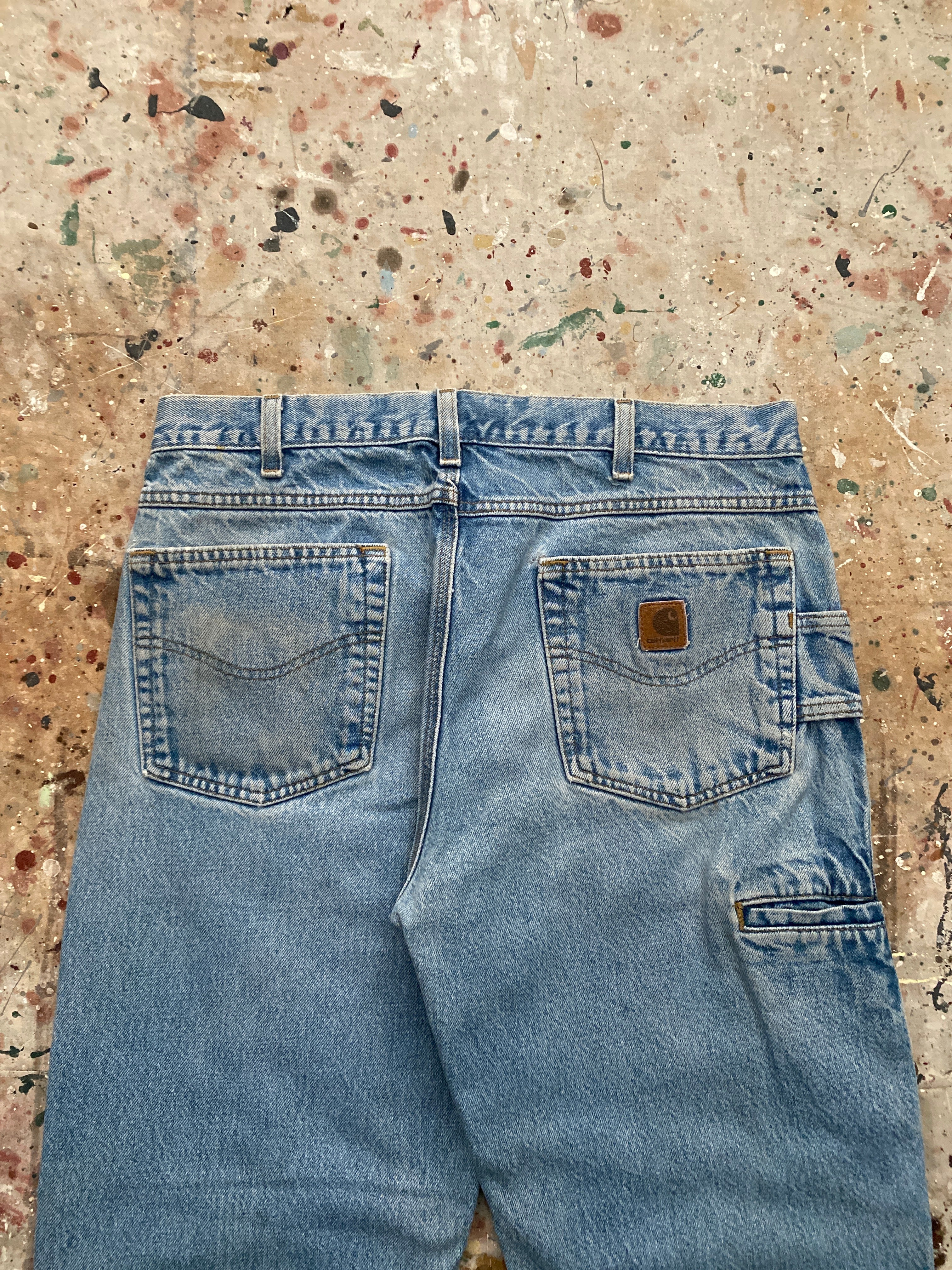 90s distressed carhartt blue jeans