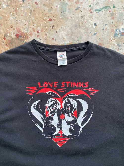 00s faded black "love stinks" skunk tee