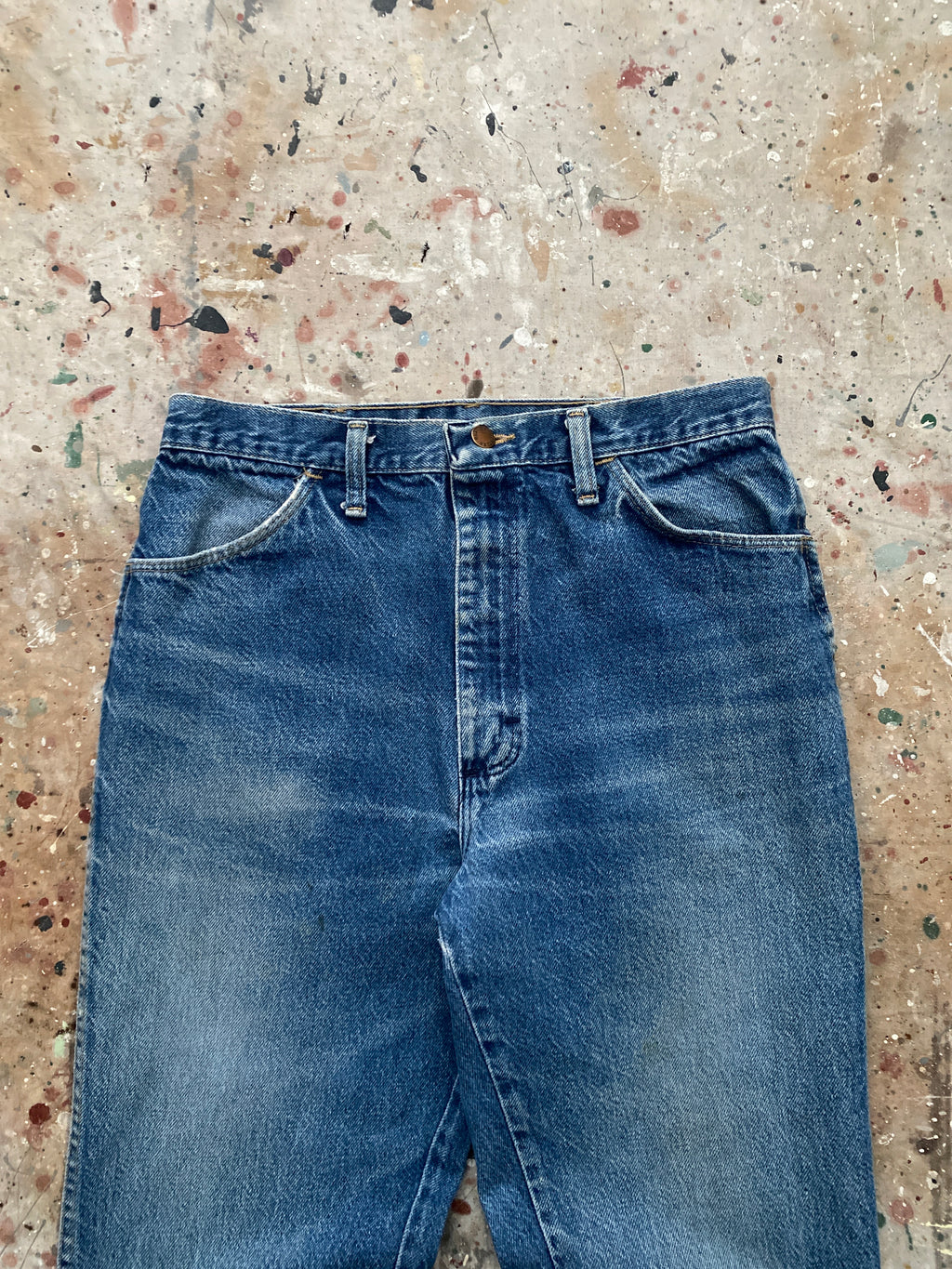 90s distressed and faded bootcut rustler jeans