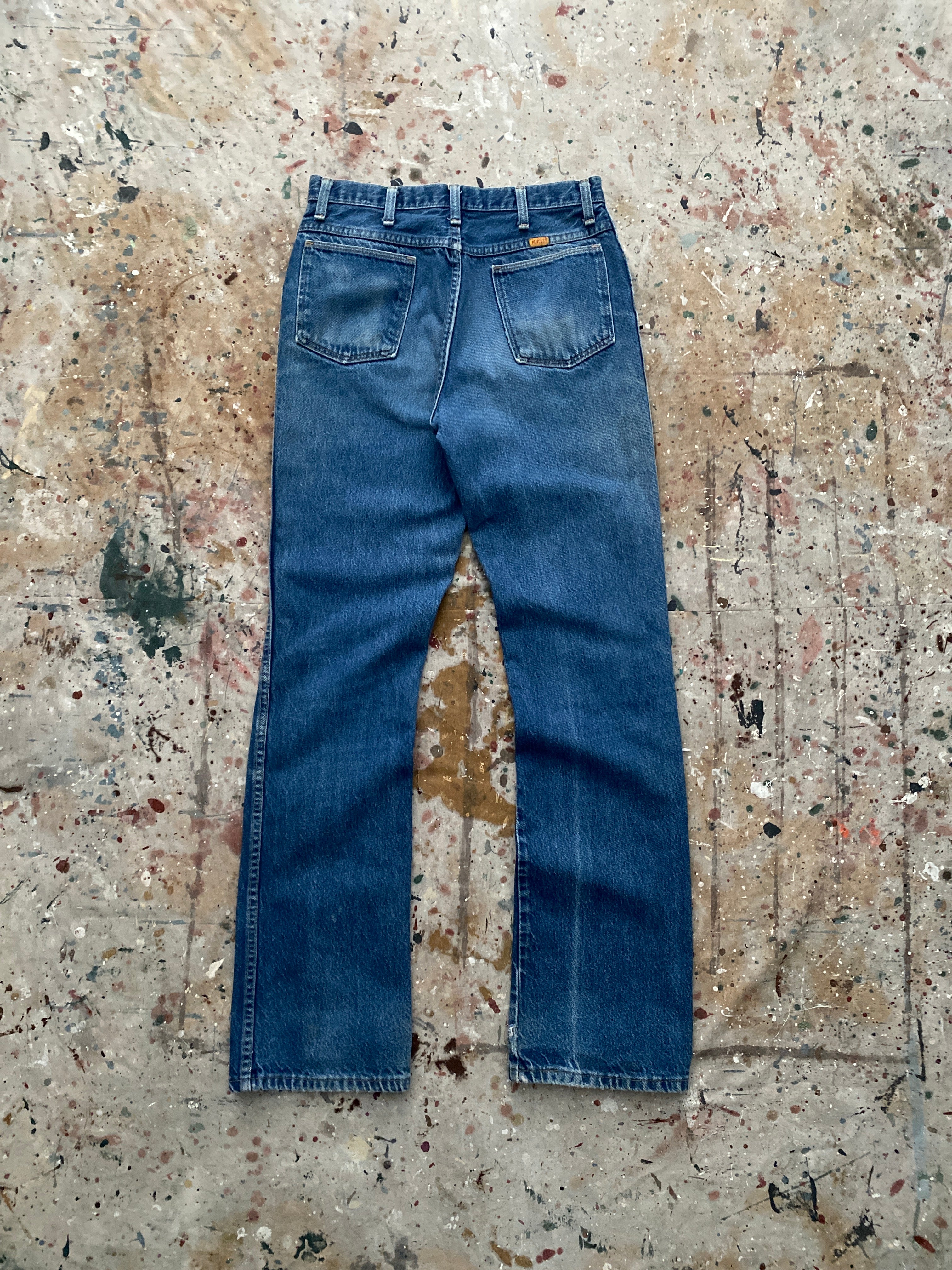 90s distressed and faded bootcut rustler jeans