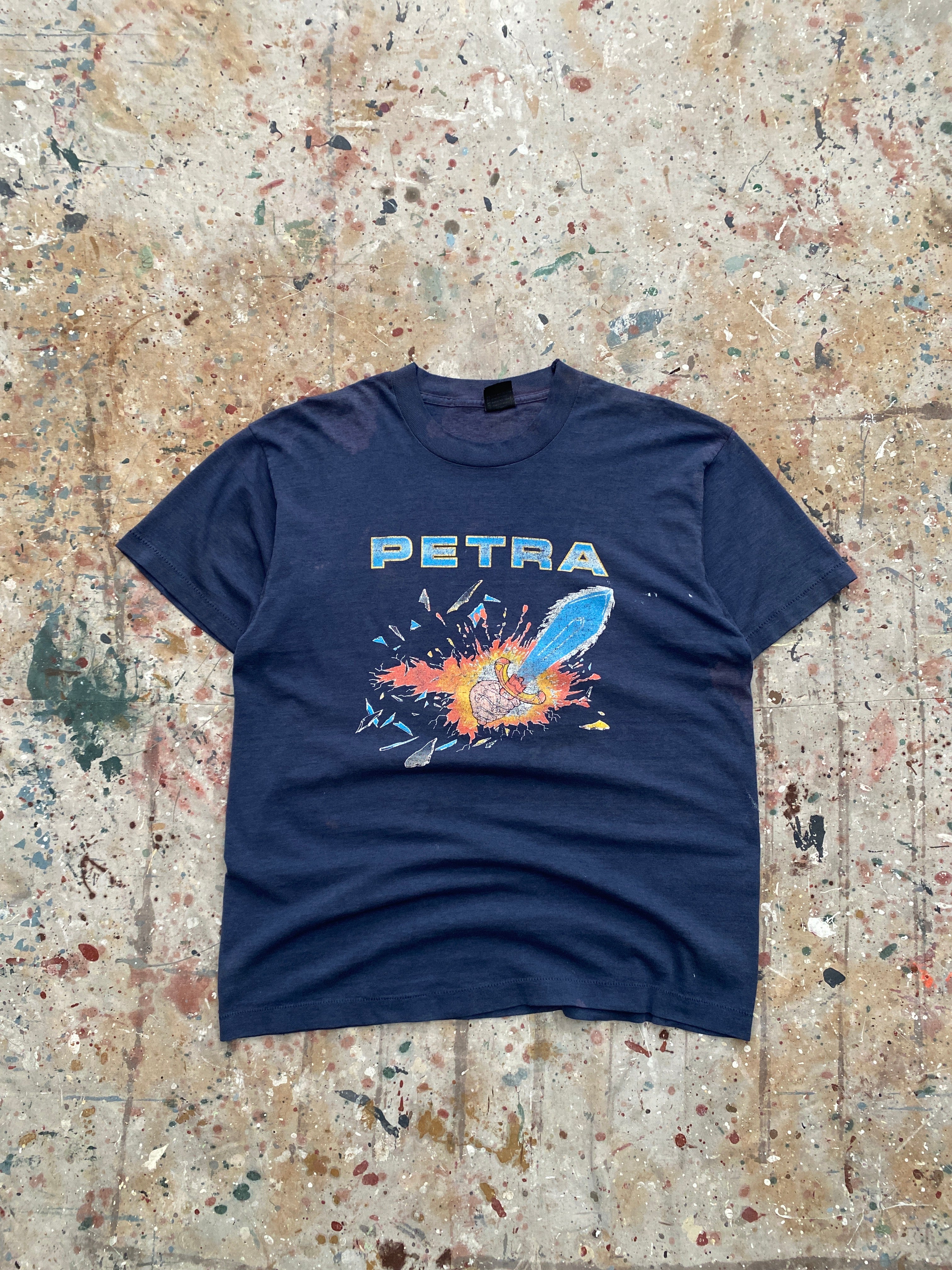 1989 distressed and faded petra "on fire" tour tee