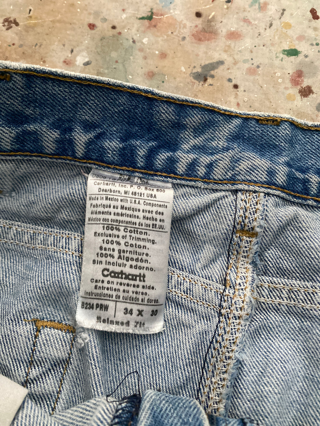 90s distressed carhartt blue jeans