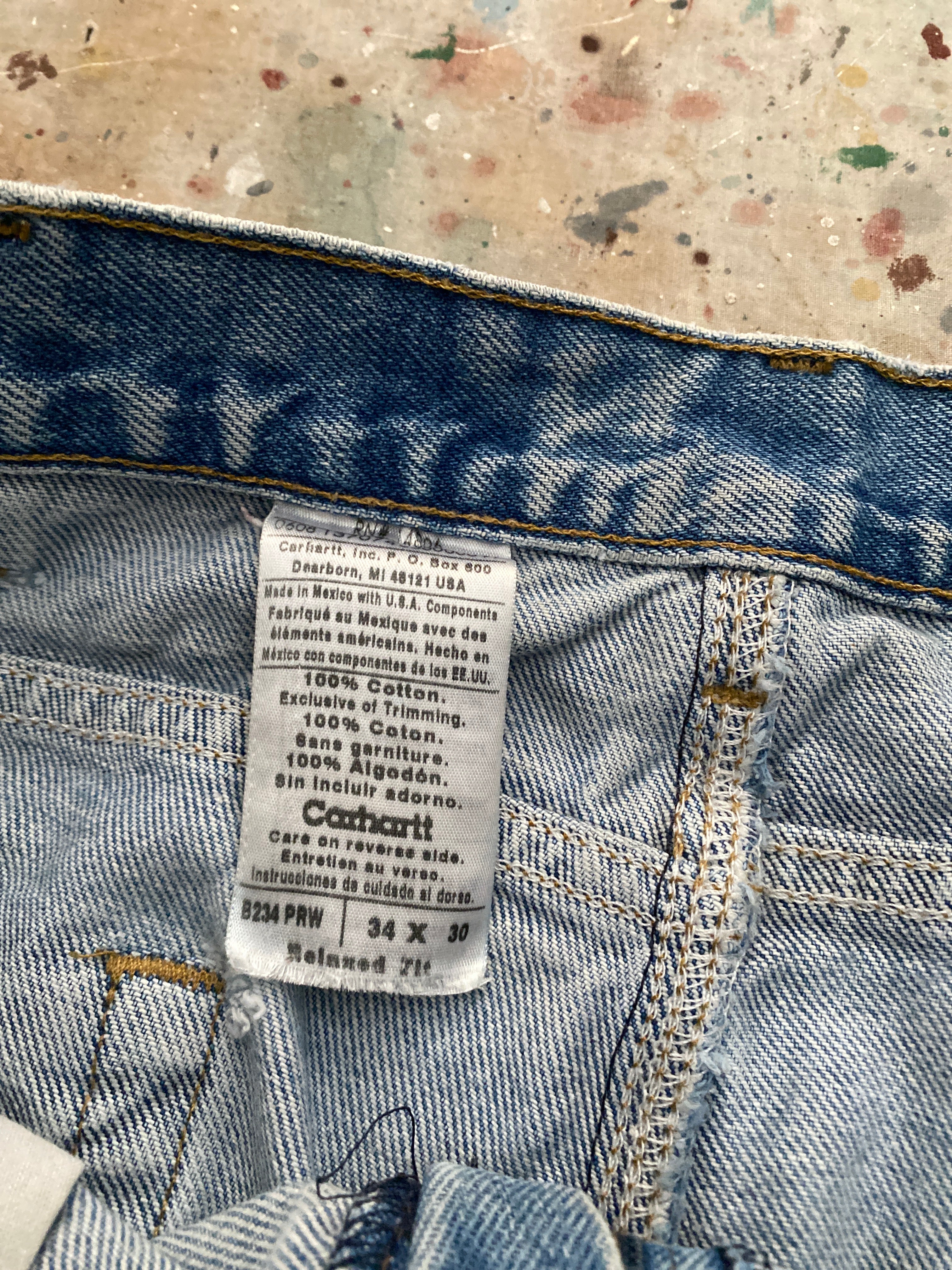 90s distressed carhartt blue jeans