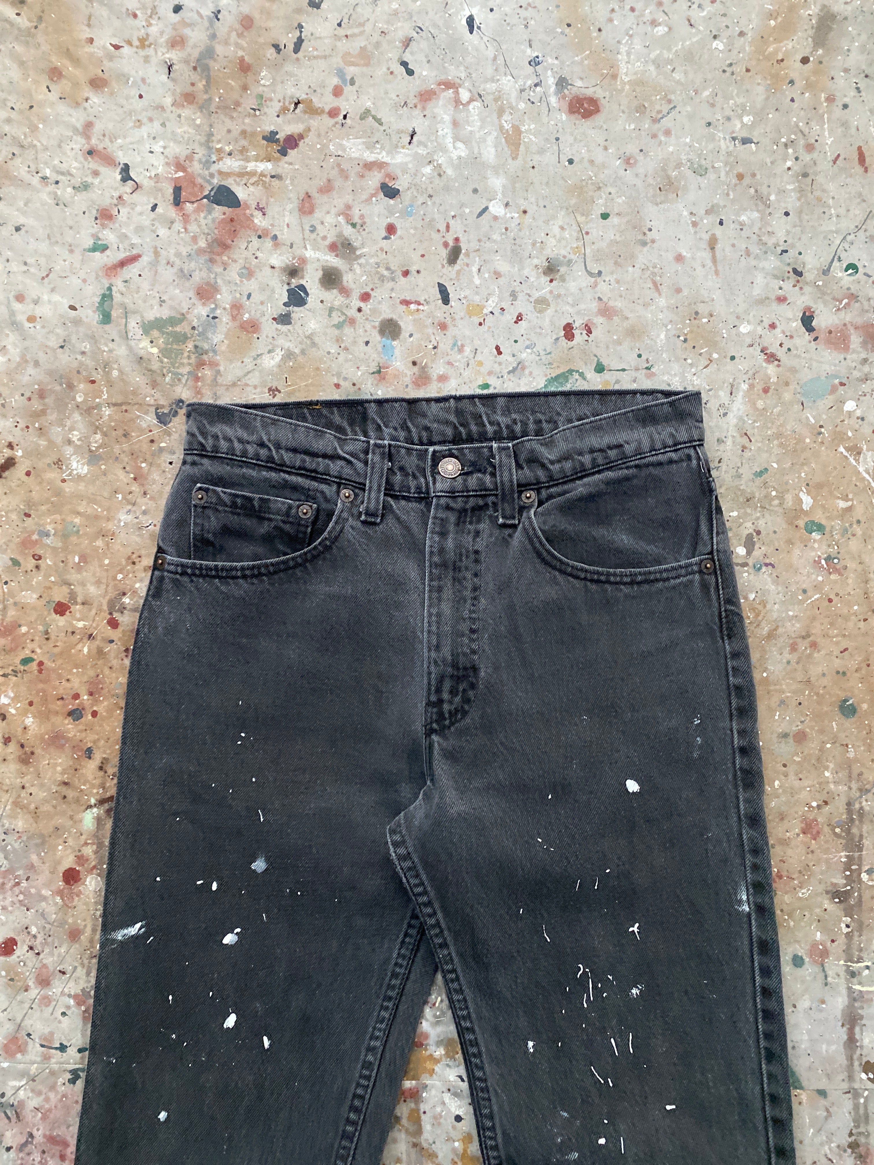 80s faded black levi's 505 released hem painter jeans