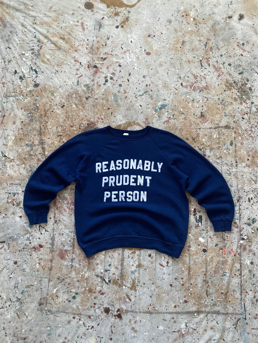 70s "reasonably prudent person" flocked sweatshirt